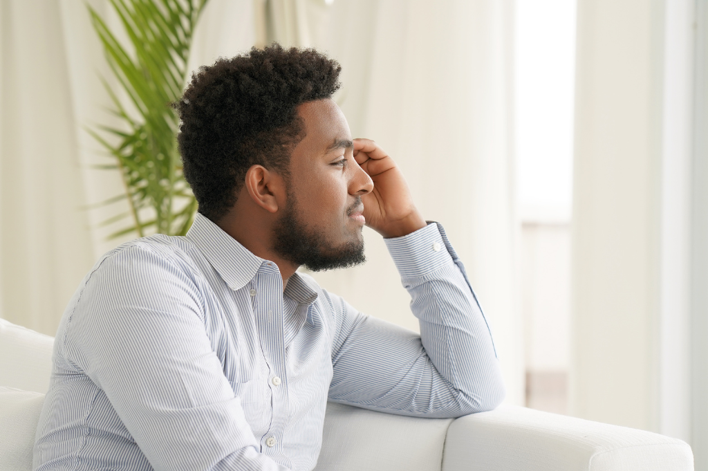 Man feeling emotional pain from grief
