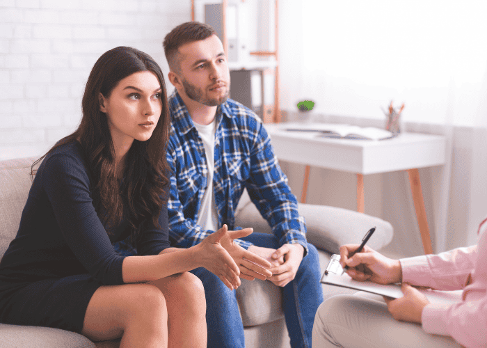Couple sitting in a separation and divorce therapy session