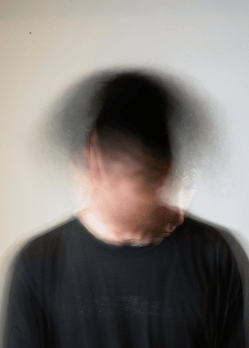 Man confused and struggling from trauma, in need of trauma-informed therapy